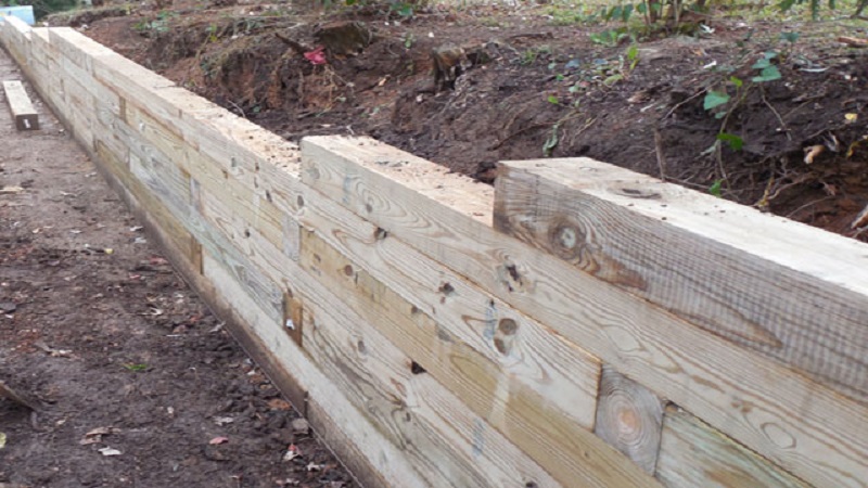 Pressure-treated wood retaining walls